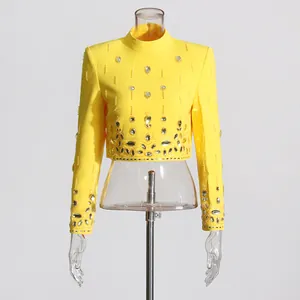 Bright yellow rhinestone crop top with long sleeves and high neck for gala events