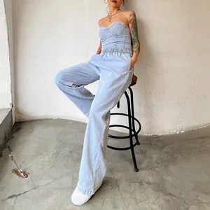 Detailed view of women's denim two-piece set with tube top and wide-leg pants