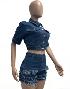 Side view of women's denim two-piece set with fringe detailing