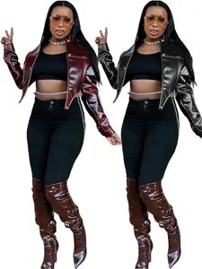 Detail view showing a slim-fit cropped faux leather jacket in burgundy and black options