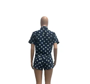 Detailed back view of a stylish blue polka dot denim two-piece set on a mannequin