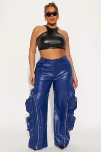 Close-up view of blue faux leather cargo pants with multi-zippered pocket detail