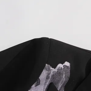 Close-up macro view of high-quality black suit fabric with grey artistic print pattern