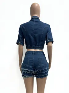 Back view of slim denim cropped jacket and frayed fringe shorts two-piece set for women