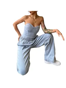Fashionable light blue denim two-piece set with a strapless corset top and loose trousers