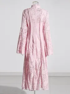 Elegant pink lace maxi dress featuring bell sleeves and a high neck stand-up collar design