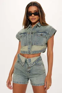 Stylish two-piece denim set featuring a cropped vest and crossover high-waisted shorts