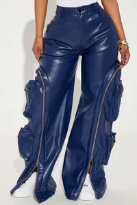 Close-up detail of blue faux leather cargo pants with zippers and multi-pockets