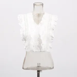 Detailed view of white French vintage lace embroidered hollow short top with ruffle sleeves