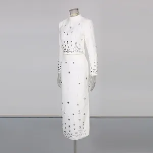 Elegant white beaded rhinestone crop top and high-waist pencil skirt two-piece set.