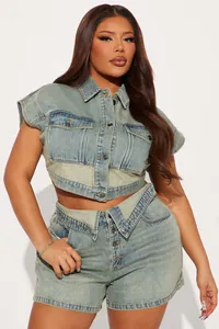 Stylish two-piece denim set with patchwork cropped jacket and high-waisted shorts