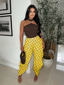 Casual yellow polka dot high-waisted harem pants for a stylish bohemian summer look