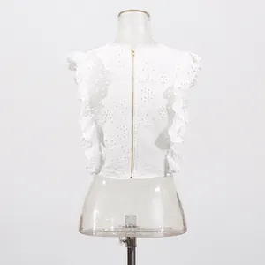 Back view of white French vintage lace embroidered hollow top featuring golden zipper detail
