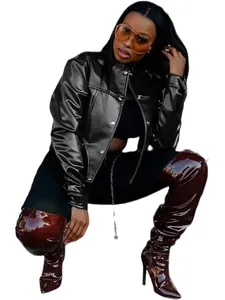 Close-up view of a stylish black faux leather crop jacket with silver button details