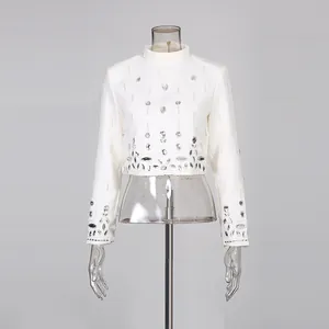 Elegant white cropped top with heavy rhinestone and bead embroidery details