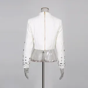 Back view of white elegant cropped top featuring heavy bead and rhinestone sleeve details
