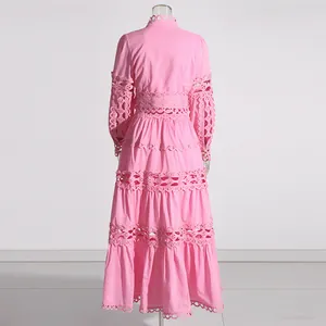 Back view of a pink French retro set with hollow-out lace and long skirt layers