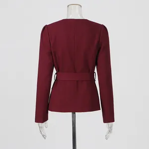 Back view of elegant wine red French vintage court style blazer with a matching waist belt