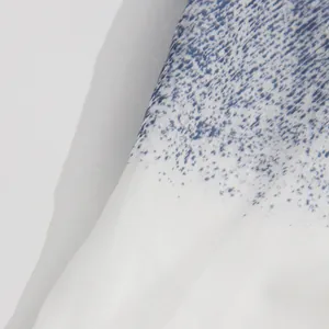 Macroweergave van blauw-witte gradiënt stoftextuur met fijn zandachtig stippatroon