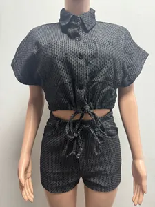 Front view of women's two-piece casual set featuring textured crop shirt and shorts