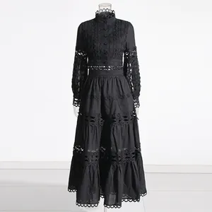French vintage black two-piece set featuring lace hollow-out top and long tiered skirt
