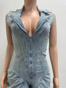 Close-up of sexy light wash denim jumpsuit featuring front zipper and bodice detail