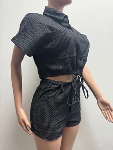 Detailed view of women's summer casual two-piece set with a textured grid pattern.