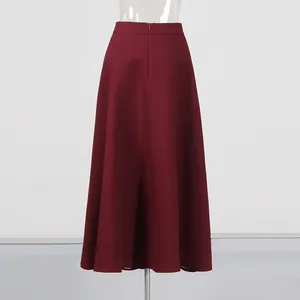 Detailed back view of an elegant high-waisted burgundy A-line skirt on a mannequin