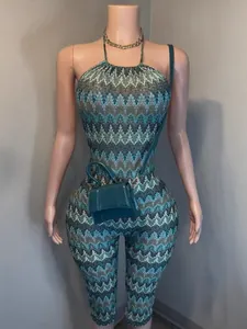 Stylish women's printed halter neck backless slim fit jumpsuit in vibrant teal patterns