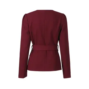 Detailed back view of a burgundy vintage puff sleeve blouse with adjustable waist belt