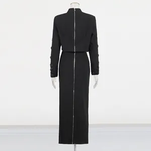 Detailed back view of black beaded two-piece set featuring a full-length silver zipper