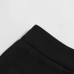 Detailed close-up view showing the fine stitching and premium black fabric texture