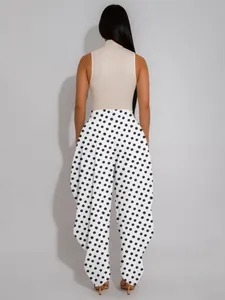 Detailed back view of high-waist polka dot wide-leg cropped tulip pants for women