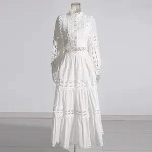 Detailed view of white French retro two-piece set with delicate lace hollow embroidery