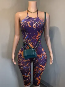 Women's halter neck backless slim fit jumpsuit with purple abstract flame print