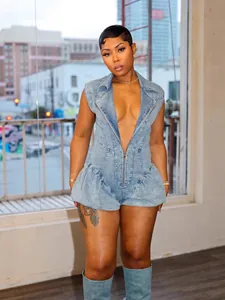 Fashionable sexy blue denim bubble romper with zipper closure and deep V-neckline