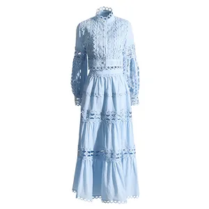 French vintage light blue lace two-piece set featuring a hollow-out top and tiered maxi skirt