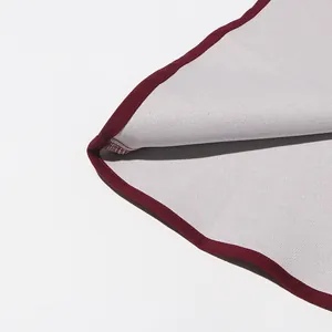 Macro view of high-quality burgundy piping and neat stitching on vintage style skirt