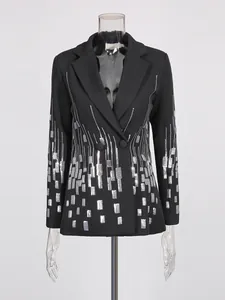 High-end women's black blazer featuring shimmering silver sequins and a structured V-neck cut.