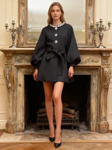 Elegant black round neck coat with rhinestone details, bubble sleeves and waist tie.