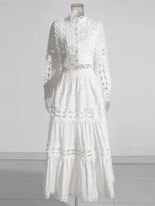 French vintage white two-piece set with hollow-out lace details and maxi skirt