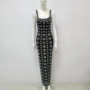 Elegant black backless sleeveless bandage maxi dress with rhinestone floral patterns.