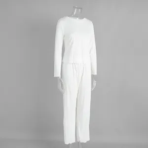 White ribbed knit long sleeve pajama set on mannequin for comfortable loungewear
