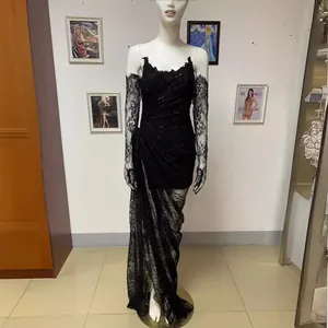 Elegant black beaded evening gown with matching lace sleeves and a sexy high slit.