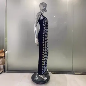 Elegant black sleeveless bandage maxi dress with rhinestone detailing on silver mannequin