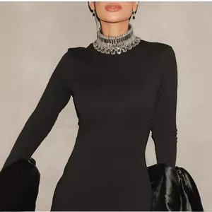Elegant black long sleeve dress featuring a crystal rhinestone collar and flare sleeves