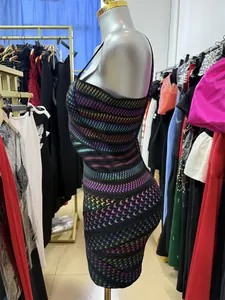 Detailed side view of a sexy bronzed houndstooth pattern bodycon dress for women