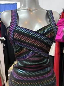 Detailed view of rainbow houndstooth pattern on this V-neck bodycon bandage dress.