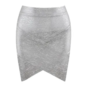Close-up detail of silver metallic bandage mini skirt featuring a stylish cross-front design