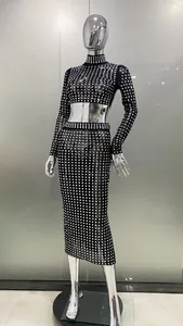 Detail showing shimmering square rhinestones on a sexy black sheer mesh two-piece set